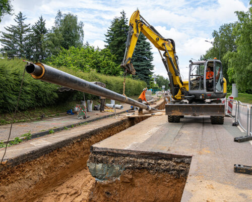 Travaux de voirie pour le chauffage urbain. Extension d'un réseau de chaleur. Pose de canalisations enterrées